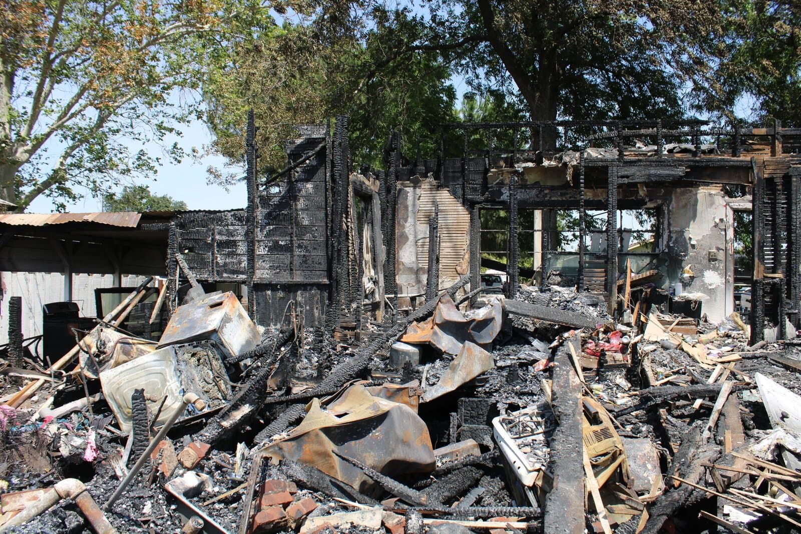 Burned commercial structure under investigation